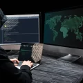 Hacker trying to hack through a system.
