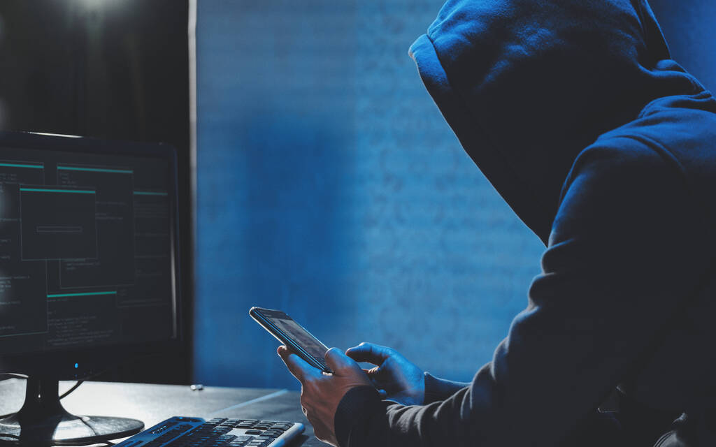 A hacker is trying to hack through the system.